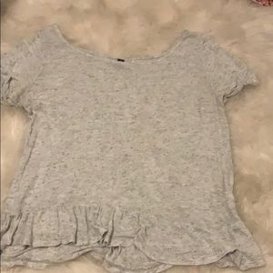 A nice flowy shirt with black specks.